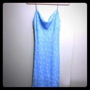 Icy blue dress with floral outline design